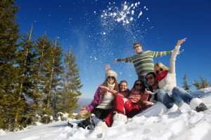 A group of young adult friends are happy to discover more things to do in Breckenridge when they aren't sking.