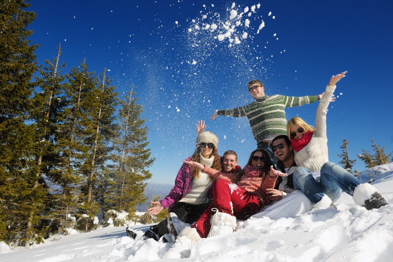 A group of young adult friends are happy to discover more things to do in Breckenridge when they aren't sking.